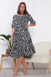 Uvercee Elegant Black & White Squiggle Print Dress