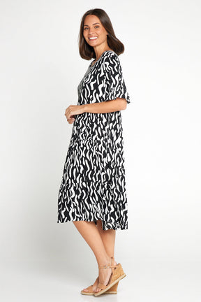Uvercee Elegant Black & White Squiggle Print Dress