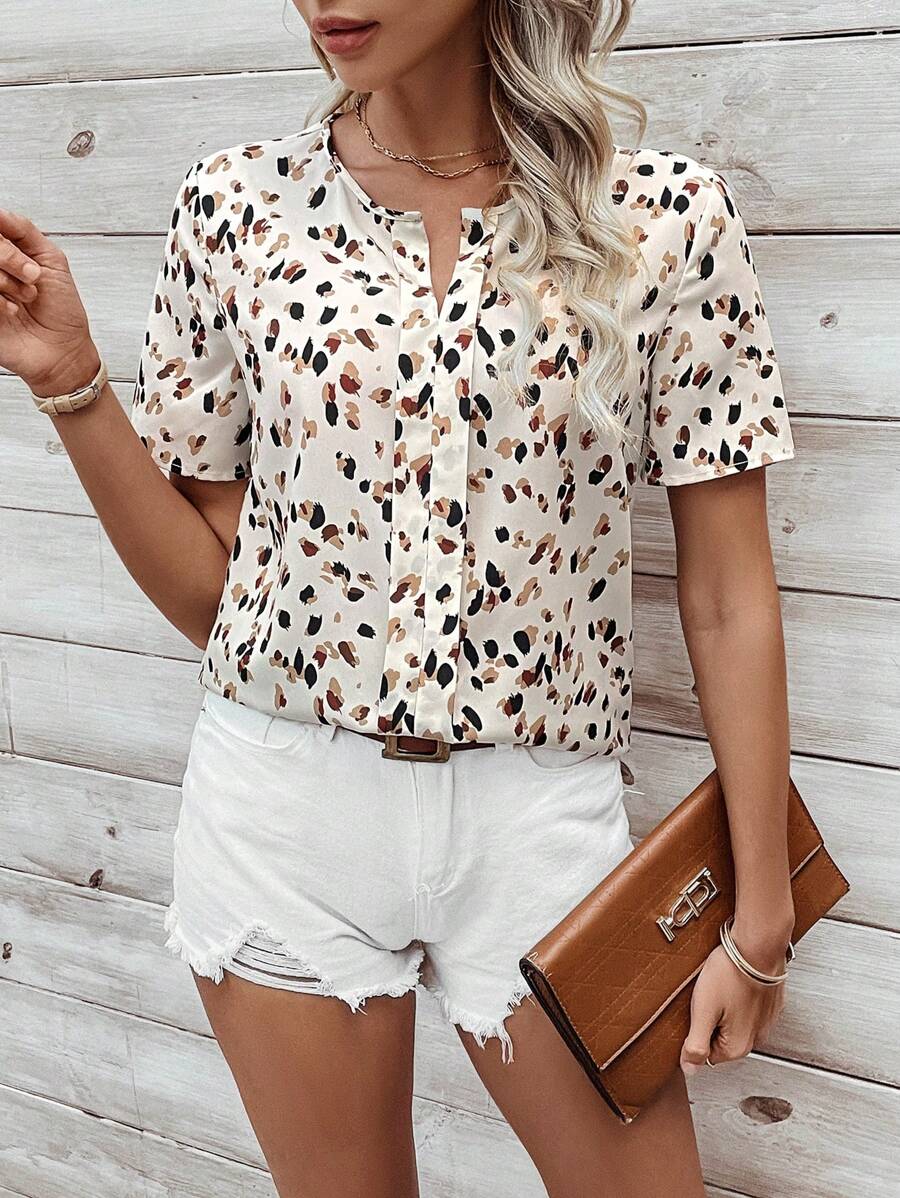 Uvercee Spotted Split V-Neck Short Sleeve Top