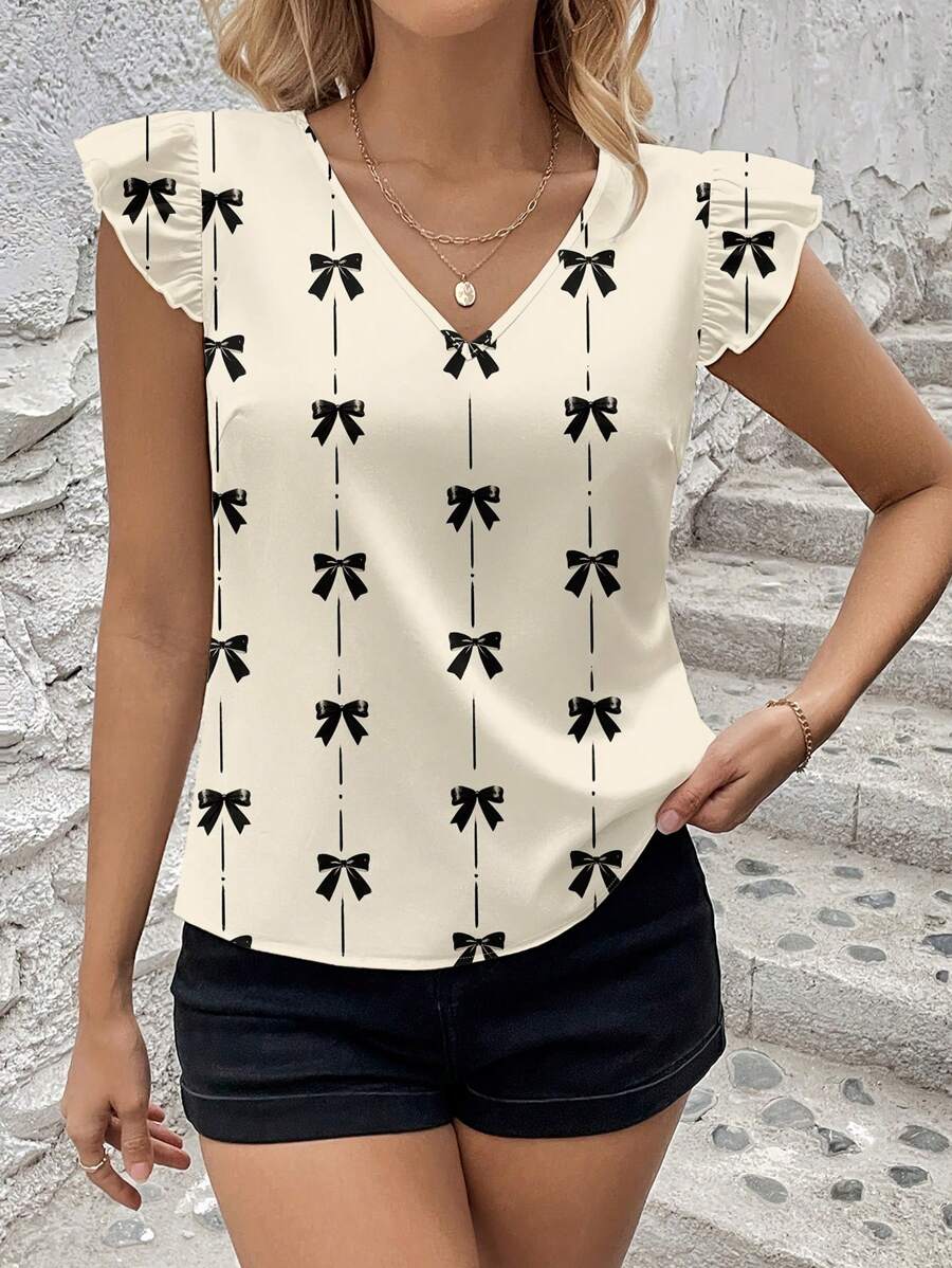 Uvercee Chic Bow-Print V-Neck Top